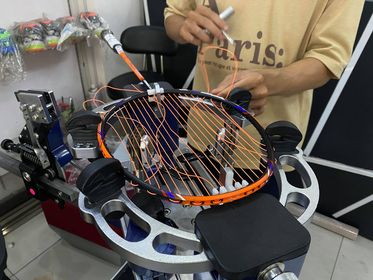 quy trin cang lai day vot cau long chuan